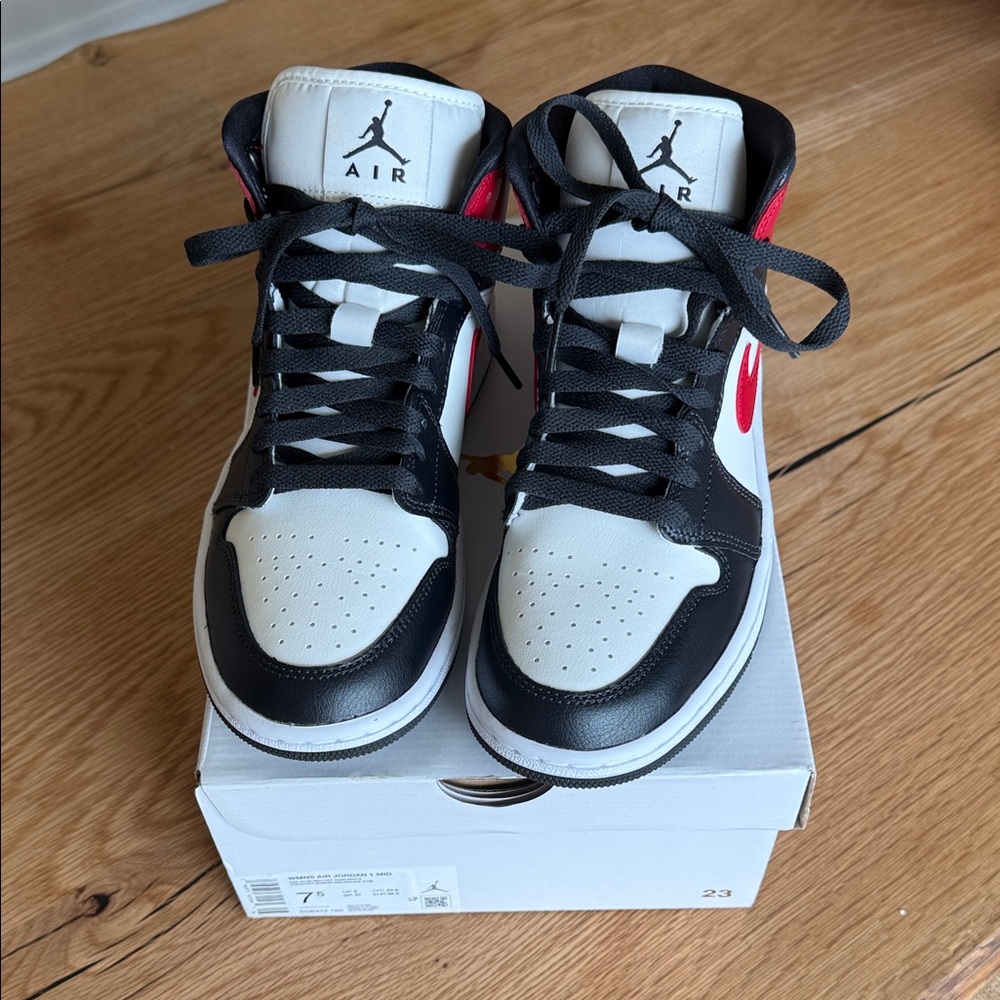 Nike Air Jordan 1 Mid Black and White and Red Athletic Shoes